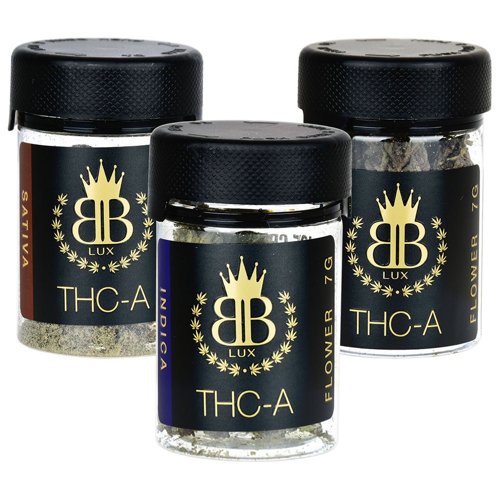 Three glass jars of Budzburn Lux THCA flower with a crown logo and BB Lux branding