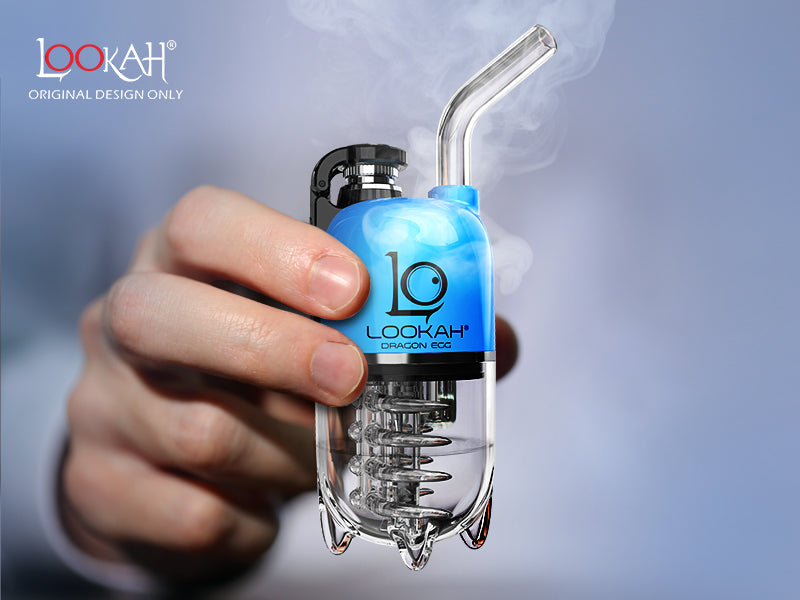 Transparent glass water pipe with blue branding perfect for the ultimate electric dab experience