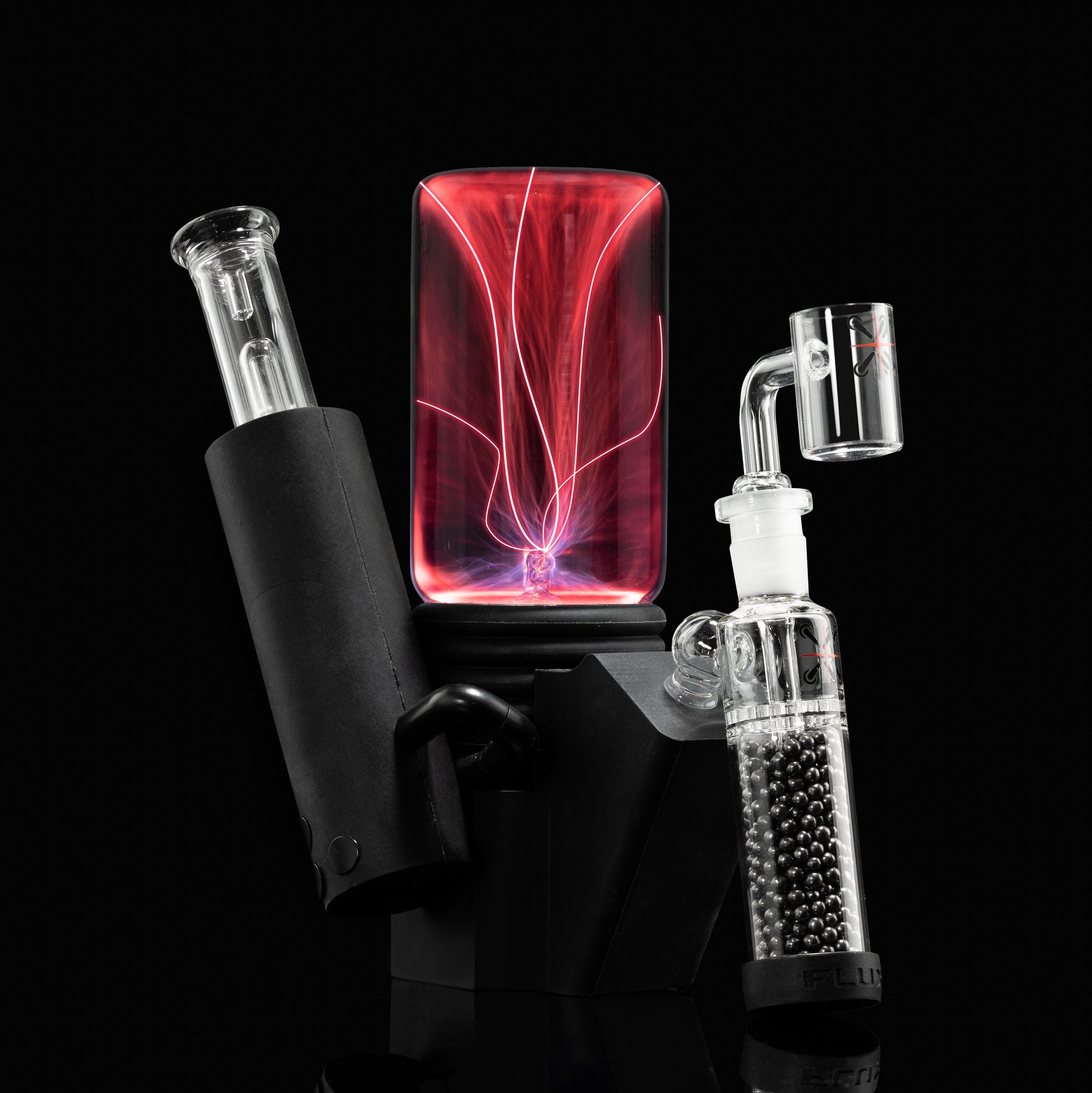 Electronic vaporizer with red display, part of the FLUX Fusion Carbon Ball Filter setup