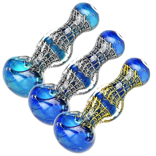 Art Deco homage glass pipe featuring stunning metallic designs and blue accents