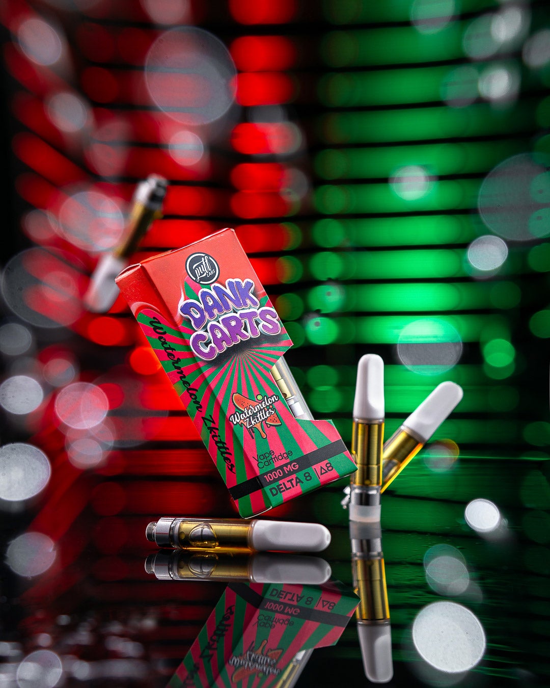 Colorful Dank Carts box with Puff Xtrax Watermelon Zkittles vape cartridge and pens