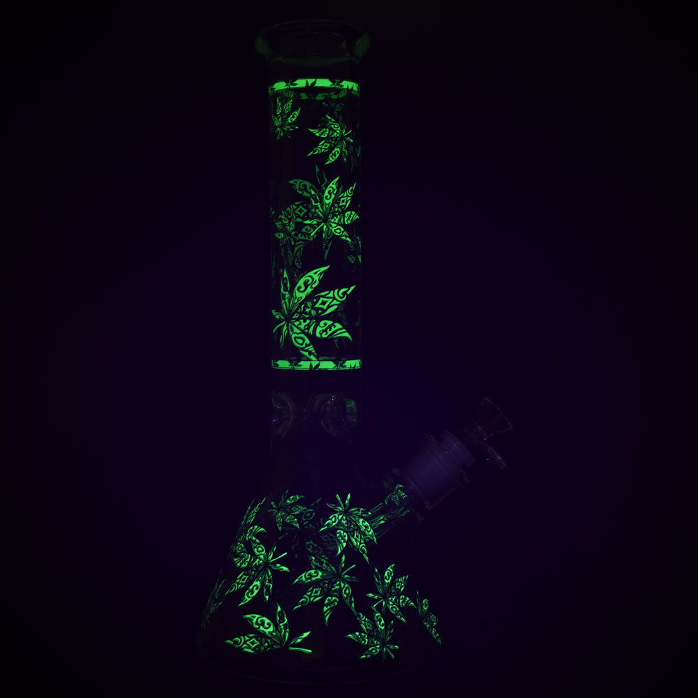 Glow in the dark hemp leaves on a stylish water pipe with downstem diffuser magic