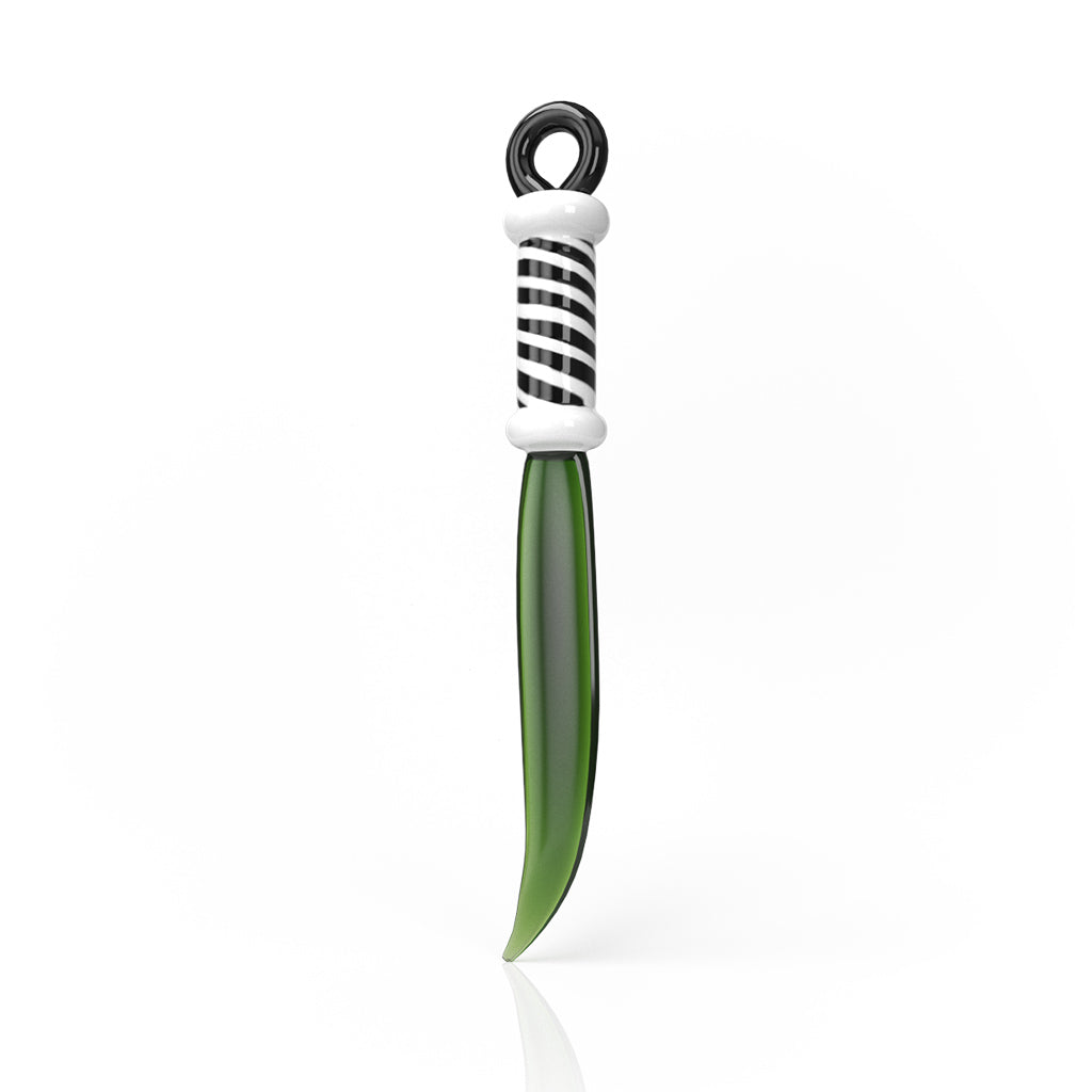 Vegetable peeler with green handle and striped grip for perfect dab tool prep